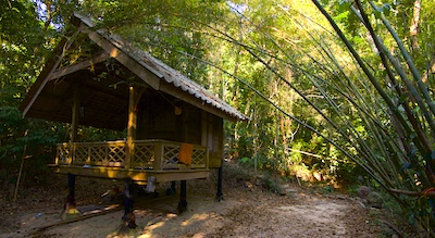 A Buddhist monk's hut or kuti in southern Thailand at Wat Suan Mokkh in Chaiya province.