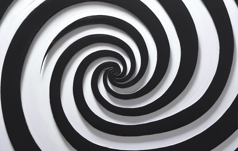 A black and white painting of a dark spiral on a grey background.