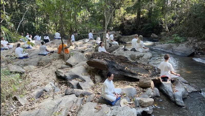 Pa Pae meditators on limestone rocks.